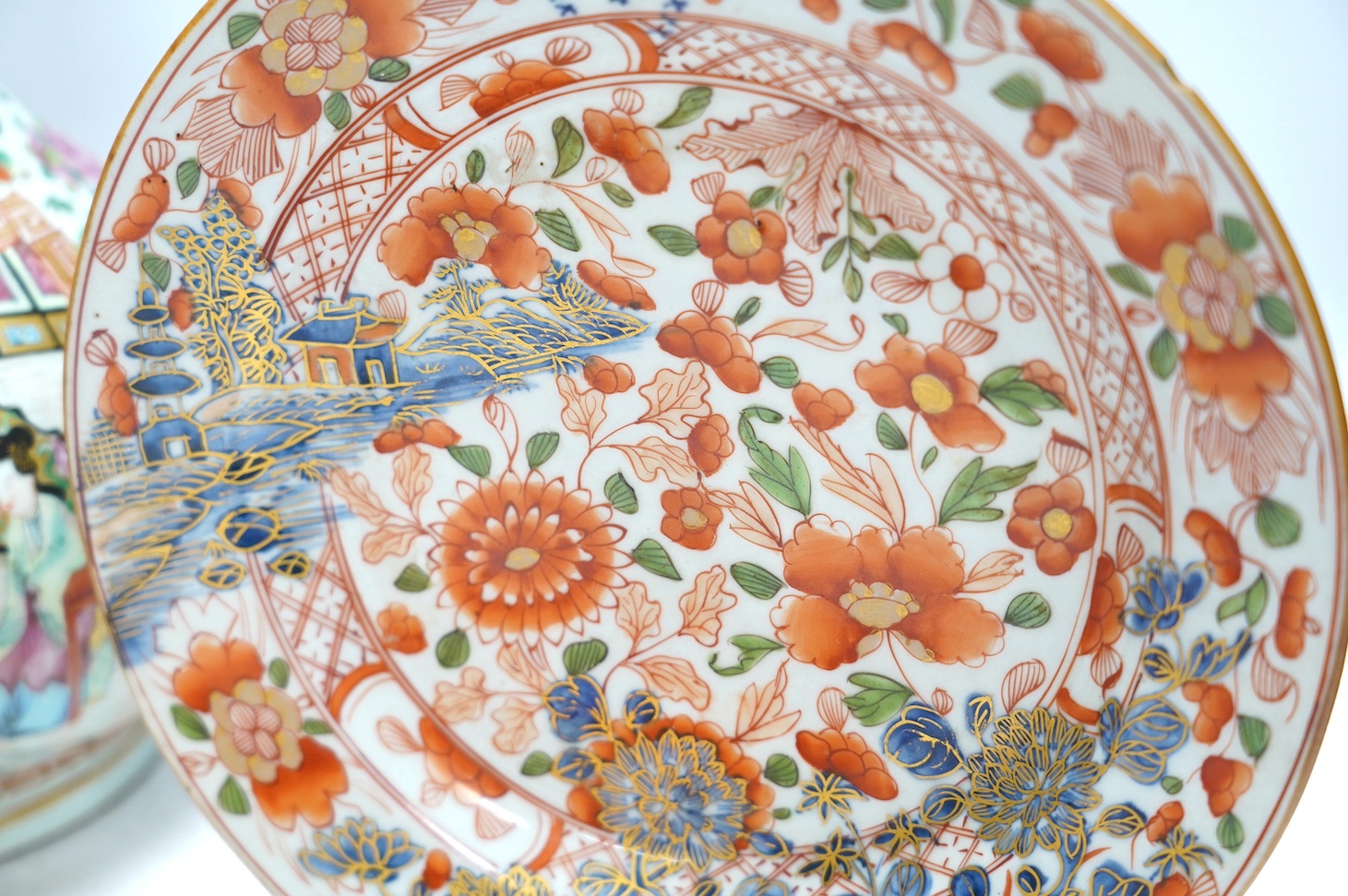 A 19th century Chinese famille rose bottle vase together with four plates, vase 28cm high. Condition - ranging from fair to good